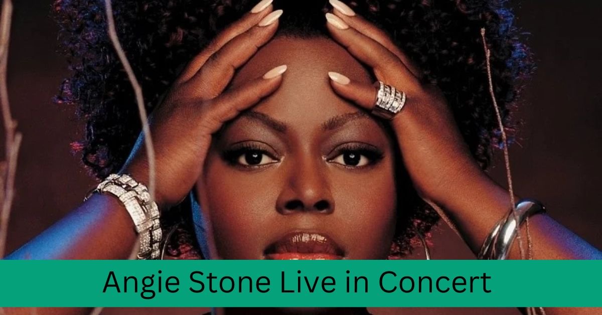  Angie Stone performing on stage with a microphone, showcasing her soulful presence.